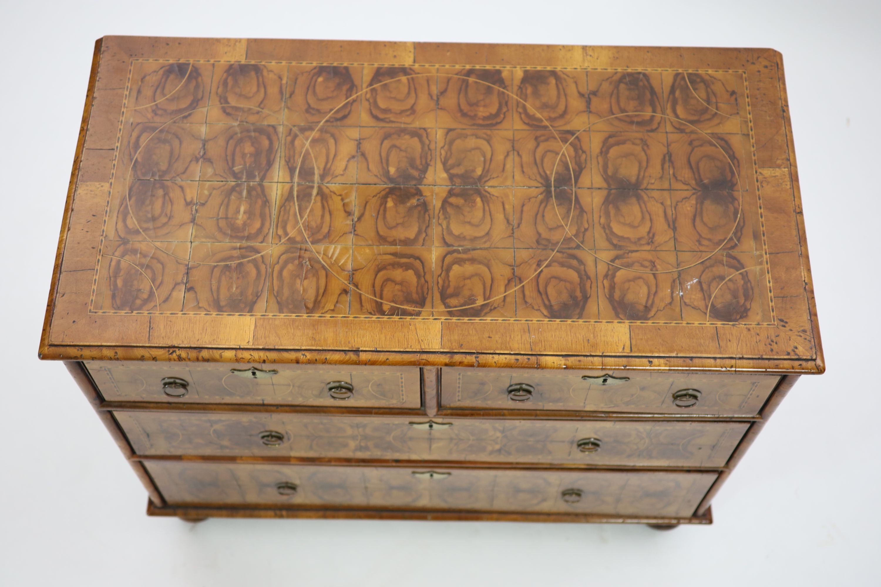 A William III and later oyster olive wood veneered chest, W.94cm D.48cm H.76cm